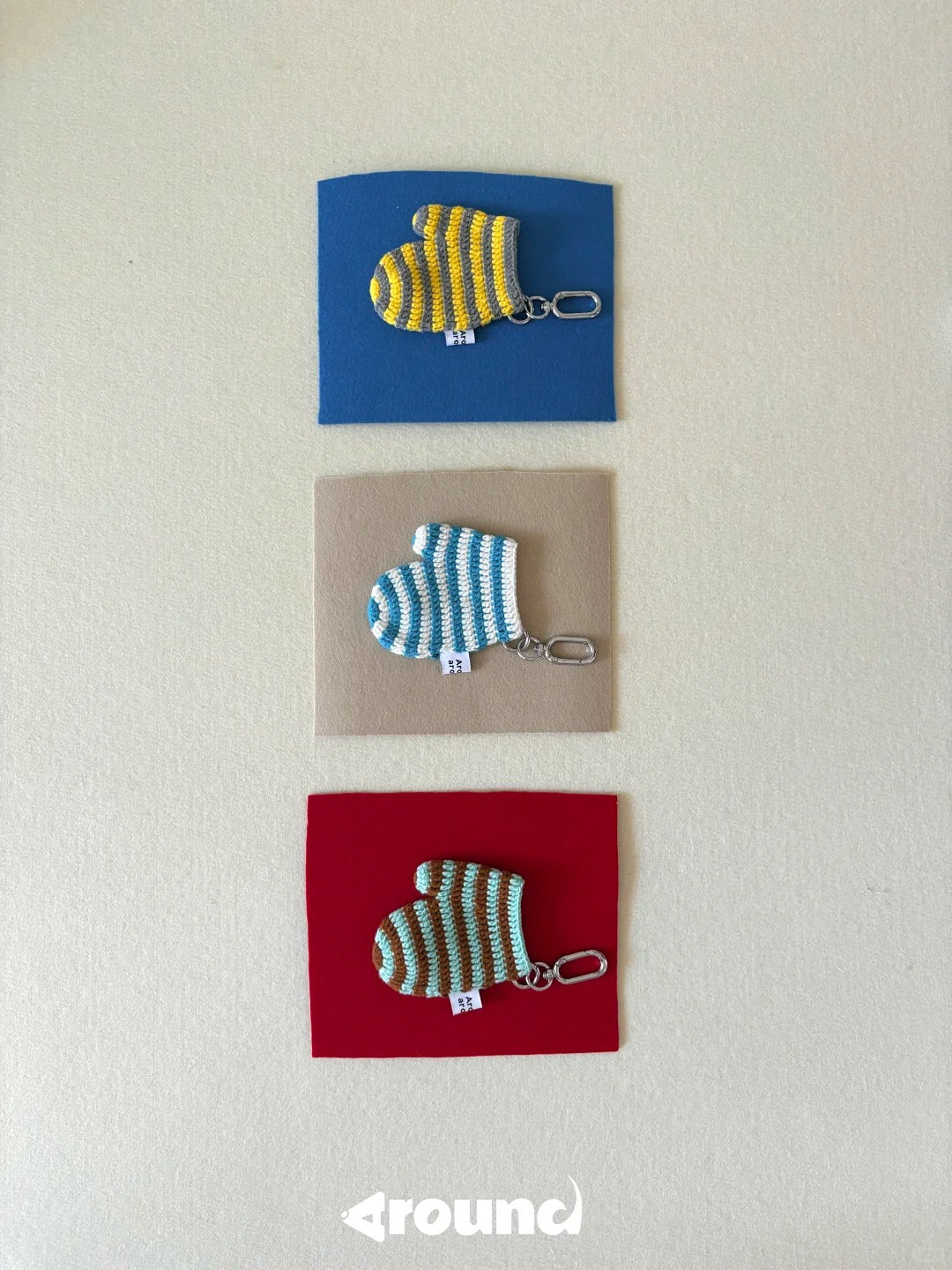 Around Around handmade mitten poop dispensers